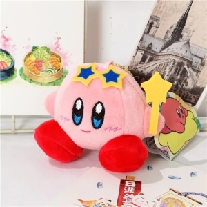 Kirby rosa plysch med blå stjärnor på huvudet